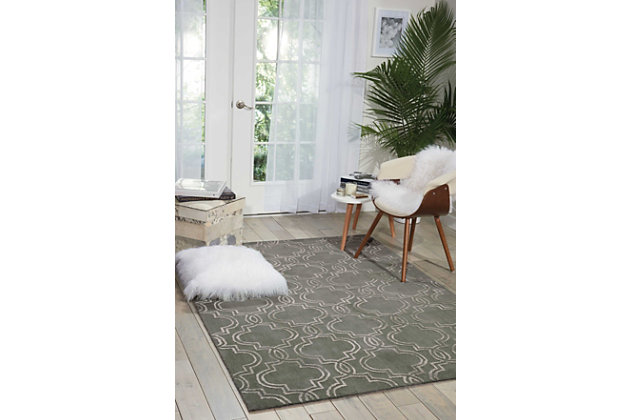 Cool, clean and serene, this cosmopolitan collection of vita hand-tufted area rugs from nourison elevates understatement to an art form. Featuring bold graphic designs rendered with a subtle hand and contemporary two-tone color palettes in gorgeous neutral hues, these brilliantly textured rugs exude a warm, urban feel that’s effortlessly elegant in its appeal. An interconnecting oversized design makes a bold and modern statement in a subtle and sophisticated way in chic shades of green and white. Hand tufted for a terrific tone and texture, this vita area rug from nourison is destined to transform even the most ordinary of rooms into something extraordinary.Hand tufted | Handcrafted | Low shedding | Rug pad recommended | Indoor only