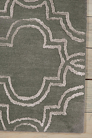 Cool, clean and serene, this cosmopolitan collection of vita hand-tufted area rugs from nourison elevates understatement to an art form. Featuring bold graphic designs rendered with a subtle hand and contemporary two-tone color palettes in gorgeous neutral hues, these brilliantly textured rugs exude a warm, urban feel that’s effortlessly elegant in its appeal. An interconnecting oversized design makes a bold and modern statement in a subtle and sophisticated way in chic shades of green and white. Hand tufted for a terrific tone and texture, this vita area rug from nourison is destined to transform even the most ordinary of rooms into something extraordinary.Hand tufted | Handcrafted | Low shedding | Rug pad recommended | Indoor only