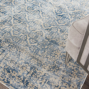 Highly refined and infinitely elegant, this thrilling collection features an alluring array of antique-inspired designs and incandescent color palettes to impart an air of sumptuous sophistication to any interior. Expertly hand loomed from supremely shiny and silky yarns and created with a beautiful tip-sheered loop pile, each resplendent area rug is outstanding in its look and feel. A damask design is both graceful and gracious, but when displayed in profound hues of blue, white and ivory, it becomes deeply dreamy. This marvelous hand-loomed area rug is infused with a breathtaking sheen for a magnificent depth and dimension.100% rayon | 100% rayon | Hand loomed | Tip-sheared loop pile | Low shedding | Indoor only; rug pad recommended | Imported