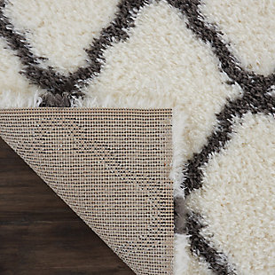 With a shag pile deep enough to lose yourself in, the nourison luxe shag area rug collection brings a warm, luxurious touch to your home, woven on state-of-the-art looms for excellent durability. This collection features sleek solid greys and neutral tones as well as traditional moroccan lattice designs, with plush 2-inch flokati shag pile for comfort that never goes out of style. This exceptionally plush 2-inch-deep shag rug from the nourison luxe shag collection has the look and feel of luxuriously soft sheepskin, and makes a perfect addition to any casual room setting. Luxurious texture and moroccan lattice pattern on soft ivory color for a warm, soothing accent.100% polyester | 100% polyester | Power loomed | Serged edges | Low shedding | Indoor only; rug pad recommended | Imported