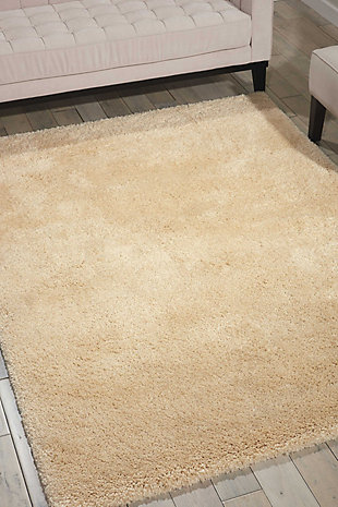We couldn’t resist naming this cozy and contemporary collection from ® by Nourison after its delicious tone and texture. Lush and lavish, each sumptuous shag rug is fabricated for exceptionally long wear and easy maintenance, with a positively posh and plush look and feel. Available in an enticing array of gorgeous neutral shades to impart an inviting intimacy to any interior. Warm and welcoming with a thrilling tone and texture, this sensational shag rug is striking, stylish and spectacular to the touch. In a beautiful bone shade to lend an irresistible and easy elegance to any decor. Our Yummy Shag rug lives in our Americana Style Guide.100% Polypropylene | 100% Polypropylene | Loom woven | Serged edges | Low shedding | Indoor Only; Rug Pad Recommended | Imported