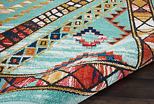 Native american textile designs bring tribal rug decor home with the exciting navajo collection of area rugs. The bright transitional hues in these colorful rugs imbue their vivid geometric designs with a sense of animation, and make a stunning color statement on white or colored grounds. Lively diamond shapes seem to quiver with animation in this vivid tribal decor rug design. Traditional motifs and a stunning border complete the appeal of this navajo collection area rug.64% polypropylene, 36% polyester | Power loomed | Serged edges | Low shedding | Indoor only | Imported