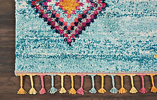 The nomad collection transports you to a vibrant and colorful moroccan rug market, with richly hued tribal rugs that feature a combination of exciting designs, multicolor fringes, and plush, luxurious fibers. Irregular diamond designs on dramatic abrash fields will bring a sense of global inspiration and energy to any room in your home. Hand-drawn diamond patterns and figures grace a deeply striated blue and ivory field, creating a truly arresting tribal decor statement with this nomad collection rug. Soft, low-pile shag texture and braided tassel finish make this the perfect accent rug for casual comfort, bringing a skandinavian influence to your favorite room.100% polypropylene | Power loomed | Serged edges | Low shedding | Indoor only | Imported
