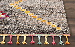 The nomad collection transports you to a vibrant and colorful moroccan rug market, with richly hued tribal rugs that feature a combination of exciting designs, multicolor fringes, and plush, luxurious fibers. Irregular diamond designs on dramatic abrash fields will bring a sense of global inspiration and energy to any room in your home. Hand-drawn diamond patterns and figures grace a deeply striated gray field, creating a truly arresting tribal decor statement with this nomad collection rug. Soft, low-pile shag texture and braided tassel finish make this the perfect accent rug for casual comfort, bringing a moroccan influence to your favorite room.100% polypropylene | Power loomed | Serged edges | Low shedding | Indoor only | Imported
