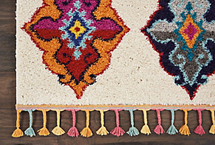 The nomad collection transports you to a vibrant and colorful moroccan rug market, with richly hued tribal rugs that feature a combination of exciting designs, multicolor fringes, and plush, luxurious fibers. Irregular diamond designs on dramatic abrash fields will bring a sense of global inspiration and energy to any room in your home. Ornamental medallion designs on a plush ivory field create an eye-catching accent with this colorful nomad collection rug. Soft, low-pile shag texture and braided tassel finish make it the perfect accent rug for casual comfort, bringing a global touch to your favorite room.100% polypropylene | Power loomed | Serged edges | Low shedding | Indoor only | Imported