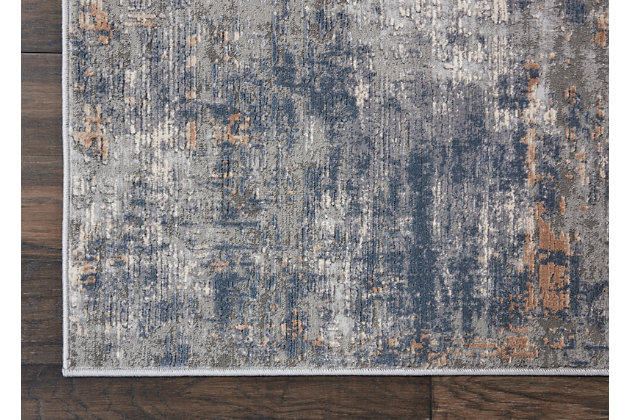 At home in a country cabin or urban loft, the rustic textures collection from nourison blends earthen tones and contemporary abstracts together in beautifully textured modern rugs that are sure to bring a rustic sensibility to any decor. This beautifully carved contemporary rug from the rustic textures collection brings abstract grays and neutrals together for a weathered, rustic decor feel that adds depth and texture to any space. High-low pile construction and subtly shifting colors are at home in urban and cabin settings alike.51% polypropylene, 49% polyester | Power loomed | Serged edges | Low shedding | Indoor only | Imported