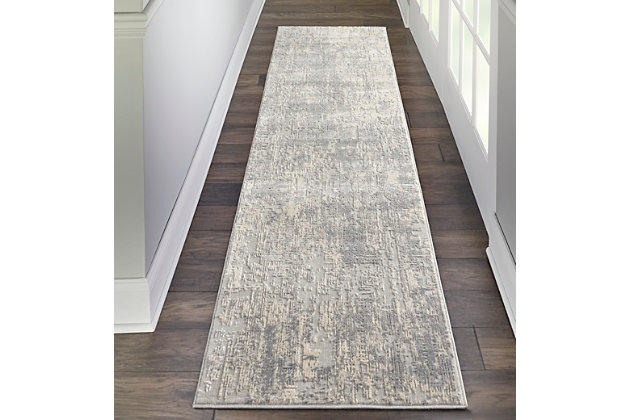 At home in a country cabin or urban loft, the rustic textures collection from nourison blends earthen tones and contemporary abstracts together in beautifully textured modern rugs that are sure to bring a rustic sensibility to any decor. This beautifully carved contemporary rug from the rustic textures collection features distressed ivory pile for a weathered, rustic decor feel that adds depth and texture to any space. High-low pile construction and subtly shifting colors are at home in urban and cabin settings alike.51% polypropylene, 49% polyester | Power loomed | Serged edges | Low shedding | Textured | Indoor only | Imported