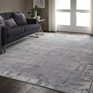 At home in a country cabin or urban loft, the rustic textures collection from nourison blends earthen tones and contemporary abstracts together in beautifully textured modern rugs that are sure to bring a rustic sensibility to any decor. Deep grays mottled with beige and cream create an artisticaly abstract visual on this beautifully carved contemporary rug from the rustic textures collection. Distressed color effects and intricate high-low pile construction create a thoroughly modern rug, with silky smooth texture that add an urban appeal to any space.51% polypropylene, 49% polyester | Power loomed | Serged edges | Low shedding | Indoor only | Imported