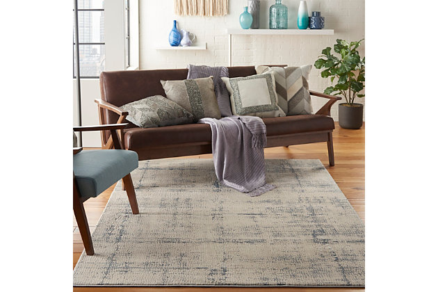 At home in a country cabin or urban loft, the rustic textures collection from nourison blends earthen tones and contemporary abstracts together in beautifully textured modern rugs that are sure to bring a rustic sensibility to any decor. This beautifully carved contemporary rug from the rustic textures collection brings abstract silver, gray, and cream patterns together for a textured look with a smooth, soft feel. High-low pile construction and subtly shifting colors are at home in urban and cabin settings alike.62% polypropylene, 38% polyester | Power loomed | Serged edges | Low shedding | Textured | Indoor only | Imported