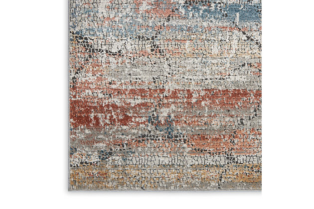 At home in a country cabin or urban loft, the rustic textures collection from nourison blends earthen tones and contemporary abstracts together in beautifully textured modern rugs that are sure to bring a rustic sensibility to any decor. Gorgeous red umber, slate blue, and granite gray earth tones mimic the look of a rugged landscape’s natural beauty in this rustic textures area rug. Its artistic design is richly enhanced with textural cut pile, for contemporary appeal in a low-shed, easy-care rug ideal for the modern or eclectic living room, dining room, bedroom, family room or home office.56% polyester, 44% polypropylene | Power loomed | Serged edges | Low shedding | Indoor only | Imported