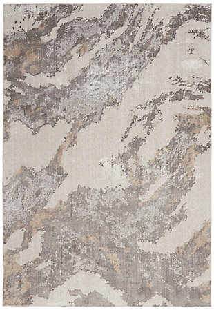 Nourison's silky textures collection of contemporary low-profile area rugs provides an infusion of modern style to your home, with designs ranging from eclectic mid-century to abstract to traditional persian design. The allure is in the sleek, soft pile, featuring a silky sheen that brings fashionable flair to match any decor in your favorite room. Exciting marbleized effects send swirls of luminous earth tones across this fascinating silky textures rug. It's a masterwork of textile design in a palette of warm, modern neutrals. Ideal for a contemporary touch in any room.50% viscose, 50% polyester | Power loomed | Distressed finish | Low shedding | 0 | Imported