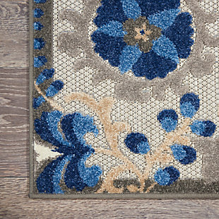This sunny and sensational collection of flat woven indoor/outdoor rugs is pretty, practical and simply perfect for high traffic areas. With its inviting assortment of classic and contemporary designs, tempting color palettes and terrific textures, these multipurpose rugs will afford an air of simple sophistication to any environment. In swirling vines and flowers of blue, turquoise, cream and grey, this nourison outdoor rug complements your patio, porch or poolside setting. High-low textures combine plush patterns with an intricately woven base for exceptional look and feel that will stand up under any conditions. Created from premium stain-resistant fibers for long wear, low maintenance, and a splendid texture.100% polypropylene | Power loomed | Hand carved | Low shedding | Indoor-outdoor | Cheerful colors and sturdy construction make these indoor/outdoor rugs a perfect centerpiece for any patio, deck or porch. | Imported