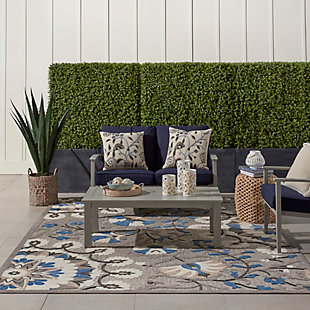 This sunny and sensational collection of flat woven indoor/outdoor rugs is pretty, practical and simply perfect for high traffic areas. With its inviting assortment of classic and contemporary designs, tempting color palettes and terrific textures, these multipurpose rugs will afford an air of simple sophistication to any environment. This outdoor rug from the aloha collection features soft cut pile and textural woven patterns in bursts of color sure to enliven any outdoor space. Twisting vines and blooms in blue, cream and grey add a festive touch of the tropics to your patio or deck.  created from premium stain-resistant fibers for long wear, low maintenance, and a splendid texture.100% polypropylene | Power loomed | Hand carved | Low shedding | Indoor-outdoor | Cheerful colors and sturdy construction make these indoor/outdoor rugs a perfect centerpiece for any patio, deck or porch. | Imported