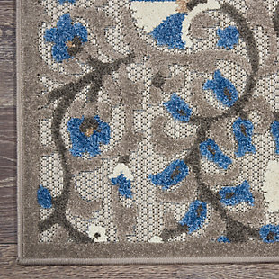 This sunny and sensational collection of flat woven indoor/outdoor rugs is pretty, practical and simply perfect for high traffic areas. With its inviting assortment of classic and contemporary designs, tempting color palettes and terrific textures, these multipurpose rugs will afford an air of simple sophistication to any environment. This outdoor rug from the aloha collection features soft cut pile and textural woven patterns in bursts of color sure to enliven any outdoor space. Twisting vines and blooms in blue, cream and grey add a festive touch of the tropics to your patio or deck.  created from premium stain-resistant fibers for long wear, low maintenance, and a splendid texture.100% polypropylene | Power loomed | Hand carved | Low shedding | Indoor-outdoor | Cheerful colors and sturdy construction make these indoor/outdoor rugs a perfect centerpiece for any patio, deck or porch. | Imported