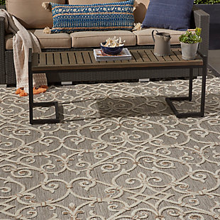 This sunny and sensational collection of flat woven indoor/outdoor rugs is pretty, practical and simply perfect for high traffic areas. With its inviting assortment of classic and contemporary designs, tempting color palettes and terrific textures, these multipurpose rugs will afford an air of simple sophistication to any environment. This outdoor rug from the aloha collection features soft cut pile and a textural woven scroll pattern sure to enliven any outdoor space. Neutral tones of cream and beige on a taupe floor with charcoal grey border, make for a complementary centerpiece for your patio or deck.  created from premium stain-resistant fibers for long wear, low maintenance, and a splendid texture.100% polypropylene | Power loomed | Hand carved | Low shedding | Indoor-outdoor | Cheerful colors and sturdy construction make these indoor/outdoor rugs a perfect centerpiece for any patio, deck or porch. | Imported
