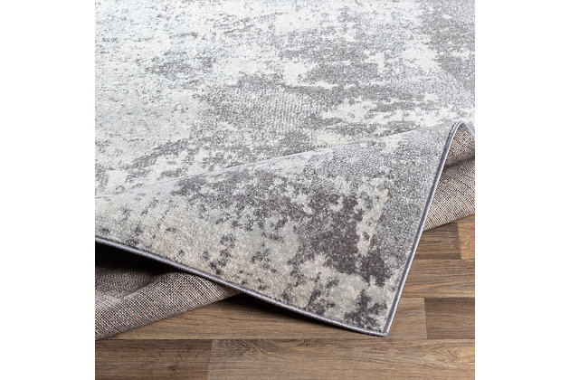 This stylish rug will effortlessly serve as the perfect centerpiece for any room. Woven with polypropylene in Turkey and featuring a low pile, it boasts durability and will instantly update your space with unique style. 100% polypropylene | Machine woven | Imported | No shedding | Spot clean