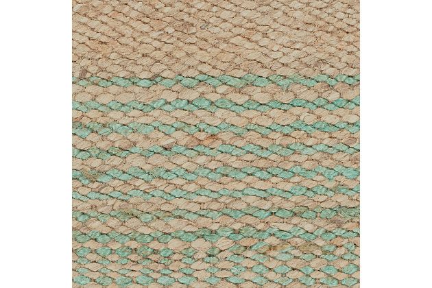 With subtle sophistication and classic style, this rug will bring a flawless look to your home. Handwoven in India with jute, the classic coloring found within this low pile piece will bring truly timeless charm to any room. It is reversible prolonging its lifespan. 100% jute | Hand Woven | Imported | Reversible | Spot clean
