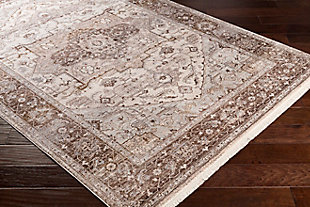 With a soft feel and lustrous sheen, this rug is a conversation starter in any room. Using traditional patterns woven in fresh colors, this piece features fringe detailing for a vintage, high end feel. Woven in Turkey with 100% polyester, this piece not only has a soft, luxurious feel, it also has No shedding for easy maintenance. 100% polyester | Machine woven | Imported | No shedding | Spot clean