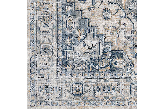 Charm your guests with the floral, lightly-distressed patterns of this elegant rug. Its stunning design infuses traditional style with trendy cool-toned shades. Made in Turkey with a blend of polypropylene and polyester, this piece is great for an entryway or bedroom. Spot or professional cleaning is recommended.90% Polypropylene, 10% Polyester | Machine woven | Imported | No shedding | Spot clean
