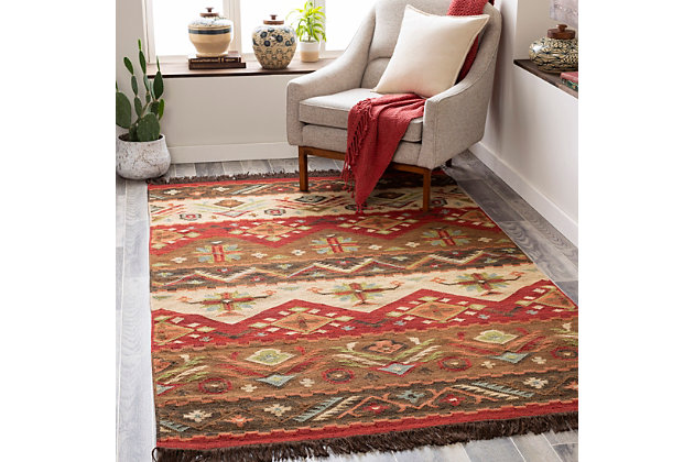 Adding a unique flair with its southwest-inspired design, this flawless rug will create a jaw-dropping look for your space. Handwoven in India with 100% wool, this reversible rug features inviting colors and a beautiful pattern that will bring warmth to any space and never go out of style. 100% wool | Hand Woven | Imported | Reversible | Spot clean