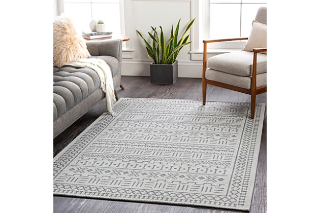 This piece seamlessly blends modern style with a global-inspired design that brings a bohemian vibe to any room. Woven in Turkey with 100% cotton, the construction of this soft, low-pile rug boasts durability, and its non-shedding feature will provide an easy-to-maintain option for any space. Spot cleaning is recommended. 100% Cotton | Machine woven | Imported | No shedding | Machine Washable (Cold Water Only – Hang Dry) or Spot Clean