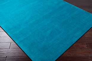 Fusing current trends with divine design, this rug is a truly exquisite look for your space. With a sleek, modern look, this rug embodies the time-honored tradition of handmade design while maintaining its affordability, making it the perfect centerpiece for your home decor. Handwoven in India with 100% wool, this piece features a cut and loop design, with a medium pile for softness and depth.100% wool | Hand Loomed | Imported | Minimal Shedding | Spot clean