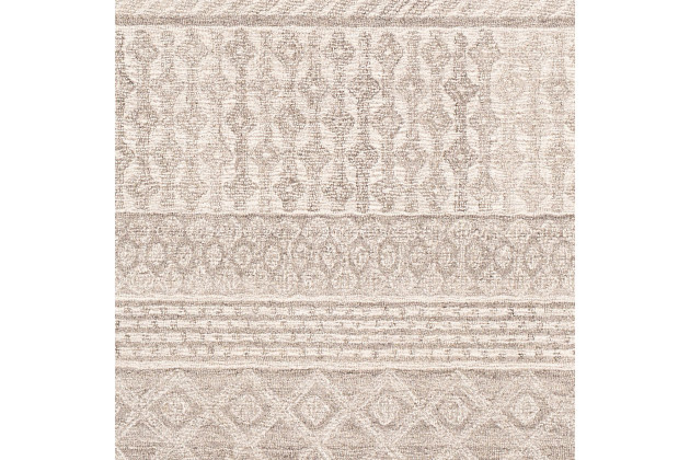 Featuring compelling global-inspired designs, this rug is everything you've been searching for and more. This handmade piece is a perfect addition to your home and will add eclectic charm to any space. Tufted by hand with quality wool in India, it features a low pile and is an affordable and charming option.100% wool | Hand Tufted | Imported | Minimal Shedding | Spot clean