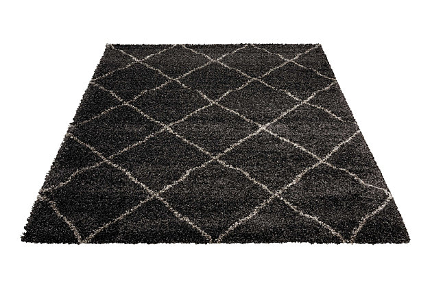 Texture and substance meet style and color with the brisbane area rug. This sensational shag is elevated with a trend-setting charcoal gray and ivory diamond pattern. Lavish pile makes this rug a haven for your feet. Who knew a beautiful home fashion could feel so good?100% polypropylene | Machine woven | Jute backing; rug pad recommended | Imported | Spot clean