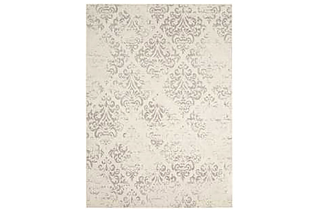 Jacquard-woven and designed in beautiful ivory, this area rug strikes the perfect balance of drama and refinement. The richly detailed fleurs-de-lis pattern adds a classic finesse that enchants with a subtle antiqued finish. Slender ribbon borders tie the whole look together.Made of polyester/cotton/rayon | Machine woven | Cotton backing; rug pad recommended | Imported | Spot clean