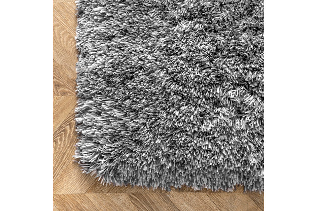 At nuLoom, we believe that floor coverings and art should not be mutually exclusive. Founded with a desire to break the rules of what is expected from an area rug, nuLoom was created to fill the void between brilliant design and affordability100% polyester | Hand tufted | Easy to clean and maintain | Imported