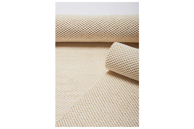 Specifically designed for hard surfaces, the high-quality firm grip rug pad rolls out so much more than slip-and-slide protection. Its advanced design combines ultra-thick cushioned comfort with an open weave construction that improves ventilation, enhances moisture evaporation and even makes vacuuming easier. And by preventing pile crushing and bunching, this rug pad is sure to extend the life of your area rug. Don’t worry…its non-skid backing won’t damage or discolor your floors.Made of polyester coated with high-grade vinyl compound | Non-skid backing | Easy to trim with scissors | Made in the u.s.a.
