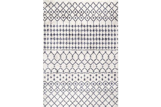 Invite warmth into your home with the captivating style of this Moroccan rug. Featuring a highly versatile geometric motif that is soft underfoot, this collection blends effortlessly with modern interiors.70% polypropylene, 30% polyester | Machine made | Easy to clean and maintain | Imported
