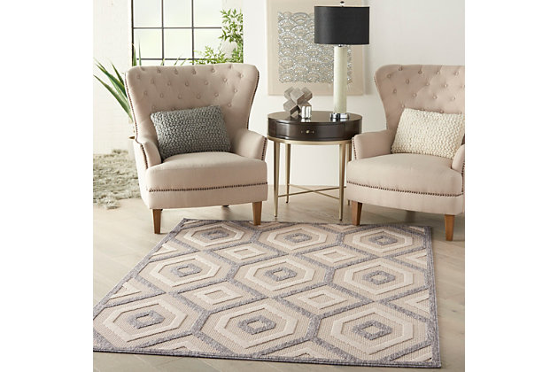 Can a rug sturdy enough for both indoor and outdoor use also be chic and attractive? For sure, if it’s from the cozumel collection. These durable and fade-resistant area rugs are ideal for the casual lifestyle and work just as well in covered outdoor locations such as patio or porch as they do in your living room, family room or other favorite spot. Distinguished by their high-low loop pile, cozumel area rugs take a visual cue from hand-carved rugs but are easily affordable and designed to withstand wear. This contemporary collection ranges from linear and geometric to sprightly florals – all enhanced by dimensional pile in today’s most coveted neutral tones. Decorating is easy (and fun!) with the casual chic of textural cozumel, power-loomed in modern poly-fibers. Soft cream and grey create muted contrast in this chic and subtle cozumel area rug. Its geometric design of concentric diamonds is beautifully highlighted by high-low loop pile and varying types of weave. A great casual look, indoors or out.100% polypropylene | Power loomed | Narrow border | Low shedding | Indoor-outdoor | High-low loop pile | Imported