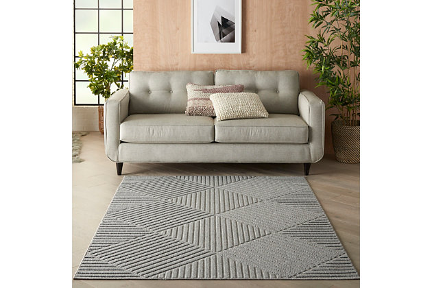 Can a rug sturdy enough for both indoor and outdoor use also be chic and attractive? For sure, if it’s from the cozumel collection. These durable and fade-resistant area rugs are ideal for the casual lifestyle and work just as well in covered outdoor locations such as patio or porch as they do in your living room, family room or other favorite spot. Distinguished by their high-low loop pile, cozumel area rugs take a visual cue from hand-carved rugs but are easily affordable and designed to withstand wear. This contemporary collection ranges from linear and geometric to sprightly florals – all enhanced by dimensional pile in today’s most coveted neutral tones. Decorating is easy (and fun!) with the casual chic of textural cozumel, power-loomed in modern poly-fibers. A striking geometric design celebrates texture with a high-low loop pile in crisp squares and stripes. This chic and contemporary cozumel area rug creates a subtle focal point in any indoor or protected outdoor location. A versatile decorating accent in misty light grey.100% polypropylene | Power loomed | Narrow border | Low shedding | Indoor-outdoor | High-low loop pile | Imported