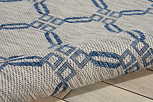 Stunning in its chic simplicity, the garden party collection of indoor/outdoor area rugs from nourison is flat woven for splendid tone, texture, and durability. Featuring a range of marvelous neutral color palettes in classic and contemporary designs, these remarkable rugs will slip seamlessly into any setting. In alluring shades of ivory and light blue, a diamond design is completely at ease in its elegance. This country side indoor/outdoor area rug from nourison is flat woven from an outstanding 100% polypropylene for a look, feel and long wear that are utterly unforgettable.100% polypropylene | Power loomed | Serged edges | Low shedding | Indoor-outdoor | Flat weave | Imported