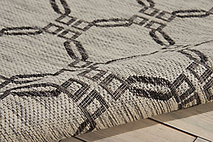 Stunning in its chic simplicity, the garden party collection of indoor/outdoor area rugs from nourison is flat woven for splendid tone, texture, and durability. Featuring a range of marvelous neutral color palettes in classic and contemporary designs, these remarkable rugs will slip seamlessly into any setting. In inviting shades of ivory and charcoal, a diamond design is completely at ease in its elegance. This country side indoor/outdoor area rug from nourison is flat woven from an outstanding 100% polypropylene for a look, feel and long wear that are utterly unforgettable.100% polypropylene | Power loomed | Serged edges | Low shedding | Indoor-outdoor | Flat weave | Imported