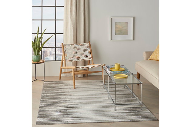 With a palette of rich blues, mysterious greys and smoky taupes, key largo offers a fresh and sophisticated look in an indoor/outdoor rug collection. These easy-care, low-shed beauties have the special, textural touch of cut-and-loop pile, so unusual in a casual rug collection. They bring unexpected elegance to your poolside, patio, porch or balcony, and are ideal for your beach home or any indoor location. The contemporary and transitional designs are flat power-loomed of 60% polypropylene and 40% polyester, so you can vacuum or hose-rinse and air-dry them with minimum fuss and maximum style impact! The subtle, shape-shifting stripes of this key largo design bring a fresh, contemporary look to your indoor or outdoor space. This versatile area rug with textural cut-and-loop pile looks as good in your favorite room as it does on a patio, porch or pool deck. Its soft grey tones are the perfect neutral in an easy-care poly-fiber blend.60% polypropylene, 40% polyester | Power loomed | Indoor/outdoor | Low shedding | Textured flat weave with elegant cut-and-loop pile offers a fresh and sophisticated look for this indoor/outdoor rug collection. | Low pile | Imported