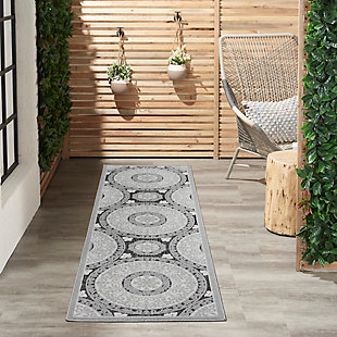 With a palette of rich blues, mysterious greys and smoky taupes, key largo offers a fresh and sophisticated look in an indoor/outdoor rug collection. These easy-care, low-shed beauties have the special, textural touch of cut-and-loop pile, so unusual in a casual rug collection. They bring unexpected elegance to your poolside, patio, porch or balcony, and are ideal for your beach home or any indoor location. The contemporary and transitional designs are flat power-loomed of 60% polypropylene and 40% polyester, so you can vacuum or hose-rinse and air-dry them with minimum fuss and maximum style impact! Circular thinking makes a great design statement! This medallion-motif area rug from the key largo collection is a versatile and elegant choice for any location, indoor or outdoor. Power-loomed in shades of grey with the special quality of cut-and-loop pile.60% polypropylene, 40% polyester | Power loomed | Indoor/outdoor | Low shedding | Textured flat weave with elegant cut-and-loop pile offers a fresh and sophisticated look for this indoor/outdoor rug collection. | Low pile | Imported