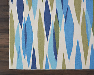 Sun n' shade collection by waverly offers a fresh perspective on indoor/outdoor rugs. The exciting color palettes and myriad designs add a timeless quality to waverly’s keen sense of today’s style. These versatile outdoor rugs are ideal for patio and poolside alike, and can withstand almost all outdoor conditions. An overlapping myriad of multicolored diamond shapes grace this smart, modern waverly bits & pieces rug by nourison. A palette of denim, aqua, soft cream and olive green makes this rug the perfect piece to go poolside, on the patio, or in an interior space.100% polyester | Power loomed | Serged edges | Low shedding | Indoor-outdoor | Imported