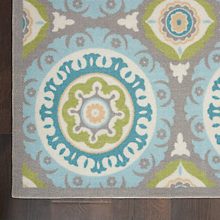 Sun n' shade collection by waverly offers a fresh perspective on indoor/outdoor rugs. The exciting color palettes and myriad designs add a timeless quality to waverly’s keen sense of today’s style. These versatile outdoor rugs are ideal for patio and poolside alike, and can withstand almost all outdoor conditions. A transcendent arrangement of interlocking spheres creates a truly mesmerizing effect in the stunning solar flair waverly rug by nourison. Shades of aqua, sky, indigo, and chartreuse adorn the ethnically inspired motifs of each sphere, giving the rug an almost cosmic appeal.100% polyester | Power loomed | Serged edges | Low shedding | Indoor-outdoor | Imported