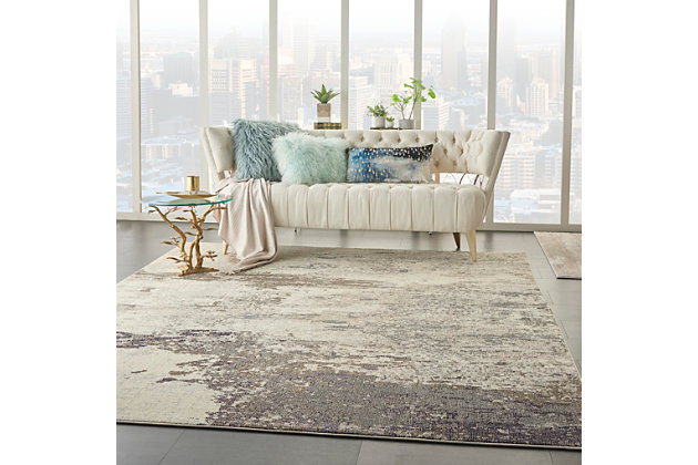 Cosmic consciousness inspires the celestial collection by nourison. These heavenly area rugs possess a dramatic beauty, with rich, saturated colors that swirl together in unique and vivid designs. Each stunning area rug conveys a sense of movement and energy that verges on divine. Evoking a feeling of natural stone, this celestial collection rug brings the outdoors in. Shades of grey, charcoal, beige and white interplay on this celestial collection rug, creating a contemporary design inspired by nature. Silky texture and a modern, neutral palette bring casual comfort to any room in your home that needs an extra stylish touch.100% polypropylene | Power loomed | Serged edges | Low shedding | Indoor only | Cut pile