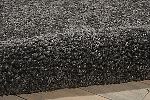Inspired by glamorous socal interior design, the malibu collection of shag area rugs from nourison are utterly lavish in their look and feel. Each rug is expertly designed in distinctive sizes and shapes to perfectly fit any room, featuring a sumptuously thick 1-inch pile and a marvelous power-loomed fabrication for plush texture and stunning sheen. With its positively plush and lush fabrication, fabulously thick pile and sensational sheen, this malibu shag area rug from nourison is as extravagant to the eye as it is underfoot. In a dramatic shade of dark grey, this sensational power loomed shag rug will bring a fashion-forward flair to any room.100% polypropylene | Power loomed | Serged edges | Low shedding | Indoor only | Shag pile | Imported