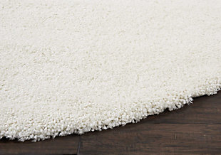 Inspired by glamorous socal interior design, the malibu collection of shag area rugs from nourison are utterly lavish in their look and feel. Each rug is expertly designed in distinctive sizes and shapes to perfectly fit any room, featuring a sumptuously thick 1-inch pile and a marvelous power-loomed fabrication for plush texture and stunning sheen. With its positively plush and lush fabrication, fabulously thick pile and sensational sheen, this malibu shag area rug from nourison is as extravagant to the eye as it is underfoot. In an alluring shade of ivory, this sensational power loomed shag rug will bring a fresh, fashionable feel to any room.100% polypropylene | Power loomed | Serged edges | Low shedding | Indoor only | Shag pile | Imported