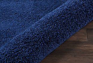 Inspired by glamorous socal interior design, the malibu collection of shag area rugs from nourison are utterly lavish in their look and feel. Each rug is expertly designed in distinctive sizes and shapes to perfectly fit any room, featuring a sumptuously thick 1-inch pile and a marvelous power-loomed fabrication for plush texture and stunning sheen. With its positively plush and lush fabrication, fabulously thick pile and sensational sheen, this malibu shag area rug from nourison is as extravagant to the eye as it is underfoot. In a smashing shade of navy, this sensational power loomed shag rug will bring a fashion-forward flair to any room.100% polypropylene | Power loomed | Serged edges | Low shedding | Indoor only | Shag pile | Imported
