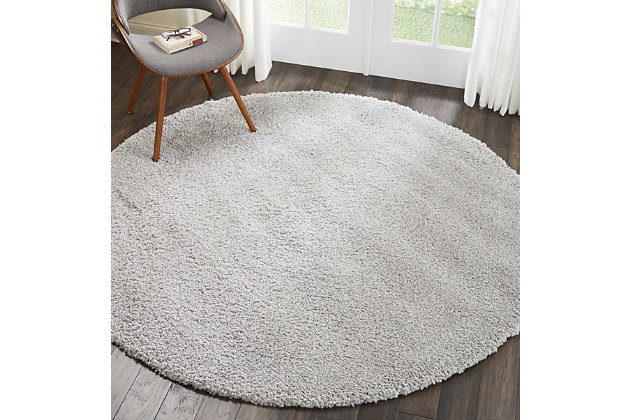 Inspired by glamorous socal interior design, the malibu collection of shag area rugs from nourison are utterly lavish in their look and feel. Each rug is expertly designed in distinctive sizes and shapes to perfectly fit any room, featuring a sumptuously thick 1-inch pile and a marvelous power-loomed fabrication for plush texture and stunning sheen. With its positively plush and lush fabrication, fabulously thick pile and sensational sheen, this malibu shag area rug from nourison is as extravagant to the eye as it is underfoot. In a splendid silvery grey shade, this sensational power loomed shag rug will bring a fashion-forward flair to any room.100% polypropylene | Power loomed | Serged edges | Low shedding | Indoor only | Shag pile | Imported