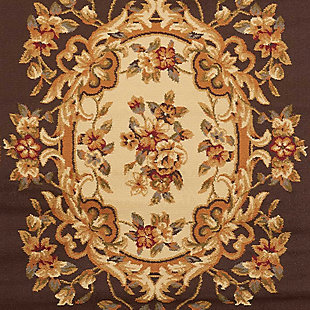 With their kinetic graphic designs and striking two-tone color palettes, these stylish rugs bring a subtle and sophisticated surge of energy to any area interior. Expertly crafted with a soft feel, this contemporary-chic collection is certain to steal the spotlight. A beautifully ornate floral centerpiece rests upon a rich coffee background elegantly defined by golden-hued borders, twining vines and floral embellishments. This rug is sure to add a striking tone of refinement to any room.100% polypropylene | Power loomed | Serged edges | Low shedding | Indoor only | Cut pile | Imported