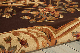 With their kinetic graphic designs and striking two-tone color palettes, these stylish rugs bring a subtle and sophisticated surge of energy to any area interior. Expertly crafted with a soft feel, this contemporary-chic collection is certain to steal the spotlight. A beautifully ornate floral centerpiece rests upon a rich coffee background elegantly defined by golden-hued borders, twining vines and floral embellishments. This rug is sure to add a striking tone of refinement to any room.100% polypropylene | Power loomed | Serged edges | Low shedding | Indoor only | Cut pile | Imported