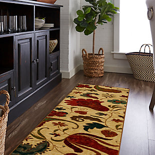 Timeless red and blue paisley and floral palmettes are cast in a warm multicolor palette over a neutral tan colored base in the transitional style, available in runners, scatters, 5x8 area rugs, 8x10 area rugs and other popular sizes. Mohawk Home's Tropical Acres Tan Red Area Rug is versatile and durably designed for kitchens, dining areas, offices, living rooms, bedrooms and more. This vibrant area rug was created with an advanced technology built for brilliant color and design clarity. Constructed on a stain resistant nylon base, this area rug is resilient despite daily wear and tear and ideal even for high traffic areas. Pet and kid friendly, simply vacuum regularly and spot clean as needed with a solution of mild detergent and water to keep this rug looking its best.Made of nylon | Spot clean with a solution of water and mild detergent, regular vacuuming helps rugs remain attractive | Durable and fade resistant, designed to hold up under high-traffic spaces with kids and pets, remains attractive for years to come | Proudly made in the USA, manufactured in America with US & imported materials