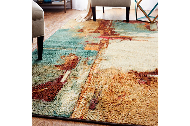 Inspired by abstract art, distressed washes of blue, beige, brown, red and tan color come together in the modern design of Mohawk Home's Aqua Fusion Area Rug. This silky soft style is available in runners, scatters, 5x8 area rugs, 8x10 area rugs, and other popular sizes, making it ideal for entryways, bedrooms, offices, kitchens, living rooms, kids spaces, dining areas and more. Flawlessly finished with advanced technology, this style features brilliant color clarity and richly defined details. The textured cut loop and cut pile base is created with a premium synthetic yarn that provides proven stain resistance power and reliable resistance to daily wear and tear. Durable and designed to be kid and pet friendly, this area rug is suitable for high traffic areas.Made of nylon | Spot clean with a solution of water and mild detergent, regular vacuuming helps rugs remain attractive | Durable and fade resistant, designed to hold up under high-traffic spaces with kids and pets, remains attractive for years to come | Proudly made in the USA, manufactured in America with US & imported materials