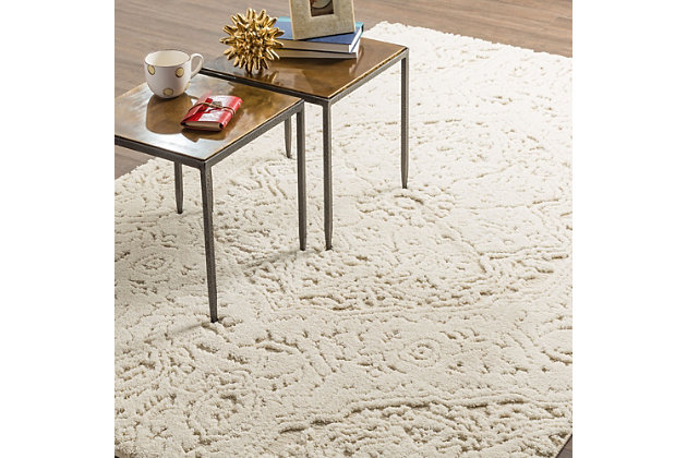 Modern carved artistry comes to life in the high low woven shag texture of Mohawk Home's Francesca Area Rug in Cream. Beautifully neutral, this versatile area rug features a refined bohemian aesthetic woven into its artisan designed motif. This area rug, available in runners, scatters, 5x8 area rugs, 8x10 area rugs and other popular sizes, is ideal for kitchens, dining areas, offices, kids spaces, nurseries, living rooms, bedrooms and more. Crafted with the luxurious plush touch of Mohawk Home's exclusive ecofriendly EverStrand, a premium synthetic yarn created from post consumer recycled plastic bottles, this rug proves you dont have to sacrifice style for sustainability. While EverStrand is renowned for its softness, this silky yarn also offers superior strength, stain resistance, illustrious fade resistant color clarity and dependable durability ideal for high traffic spaces with kids and pets.Made of polyester (EverStrand PET) | Spot clean with a solution of water and mild detergent, regular vacuuming helps rugs remain attractive | Durable and fade resistant, designed to hold up under high-traffic spaces with kids and pets, remains attractive for years to come | Proudly made in the USA, manufactured in America with US & imported materials